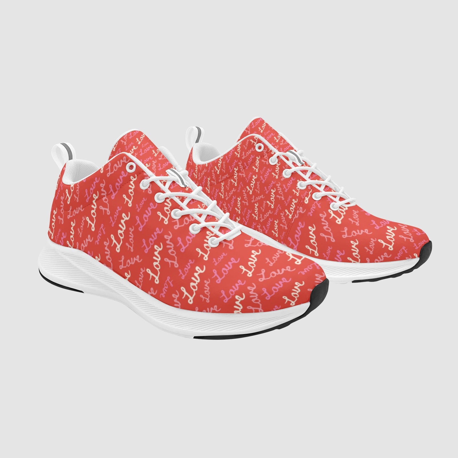 The Amore Script Runner women's red love print sneaker with white lace-up closure and lightweight white running outsole.