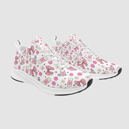 Pair of feminine nursing sneakers featuring a coquette aesthetic with pink bows, ribbon accents, and subtle medical motifs on a clean white sole.