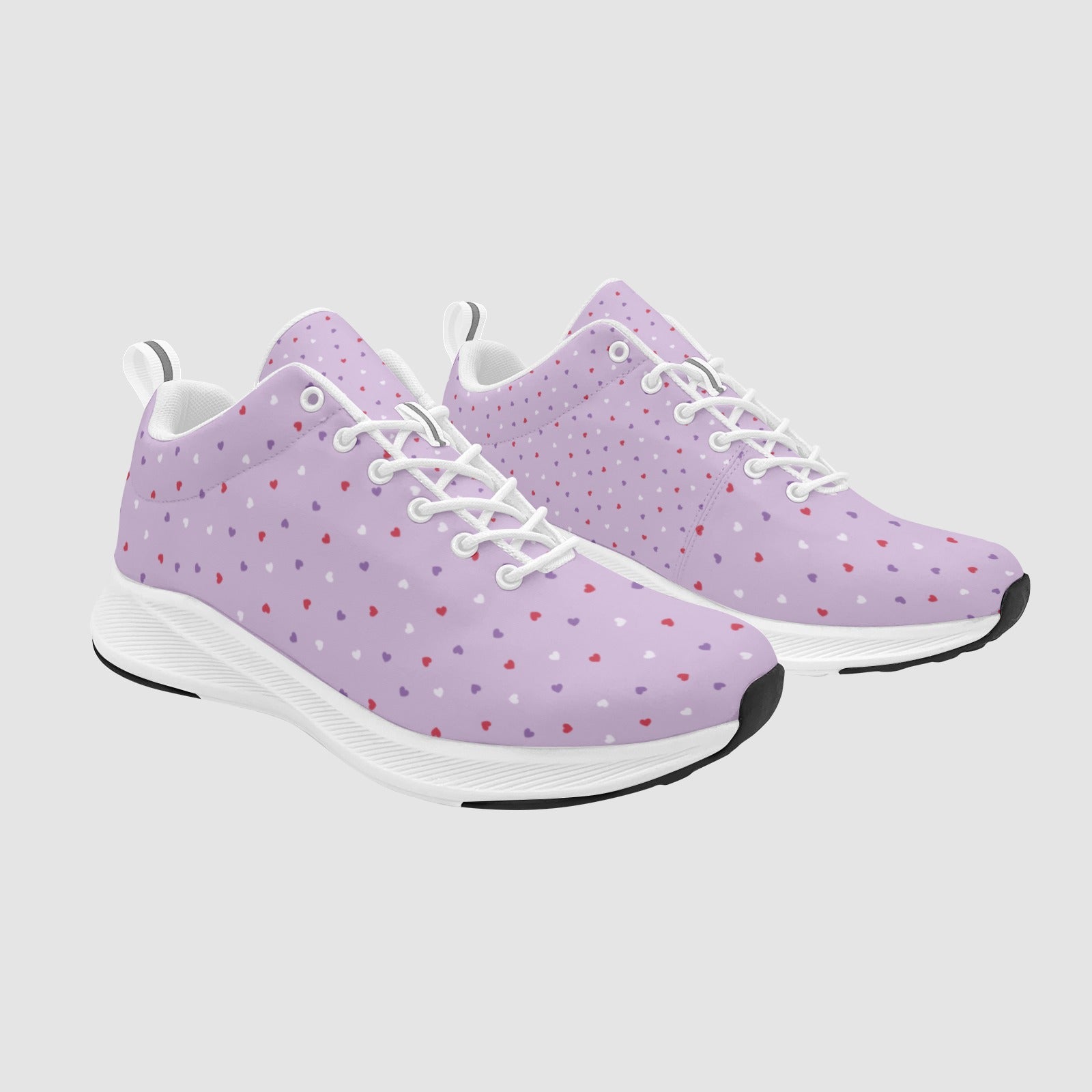 Women's Heartbeat Bloom running shoes in light lavender suede scattered with small red and white hearts.