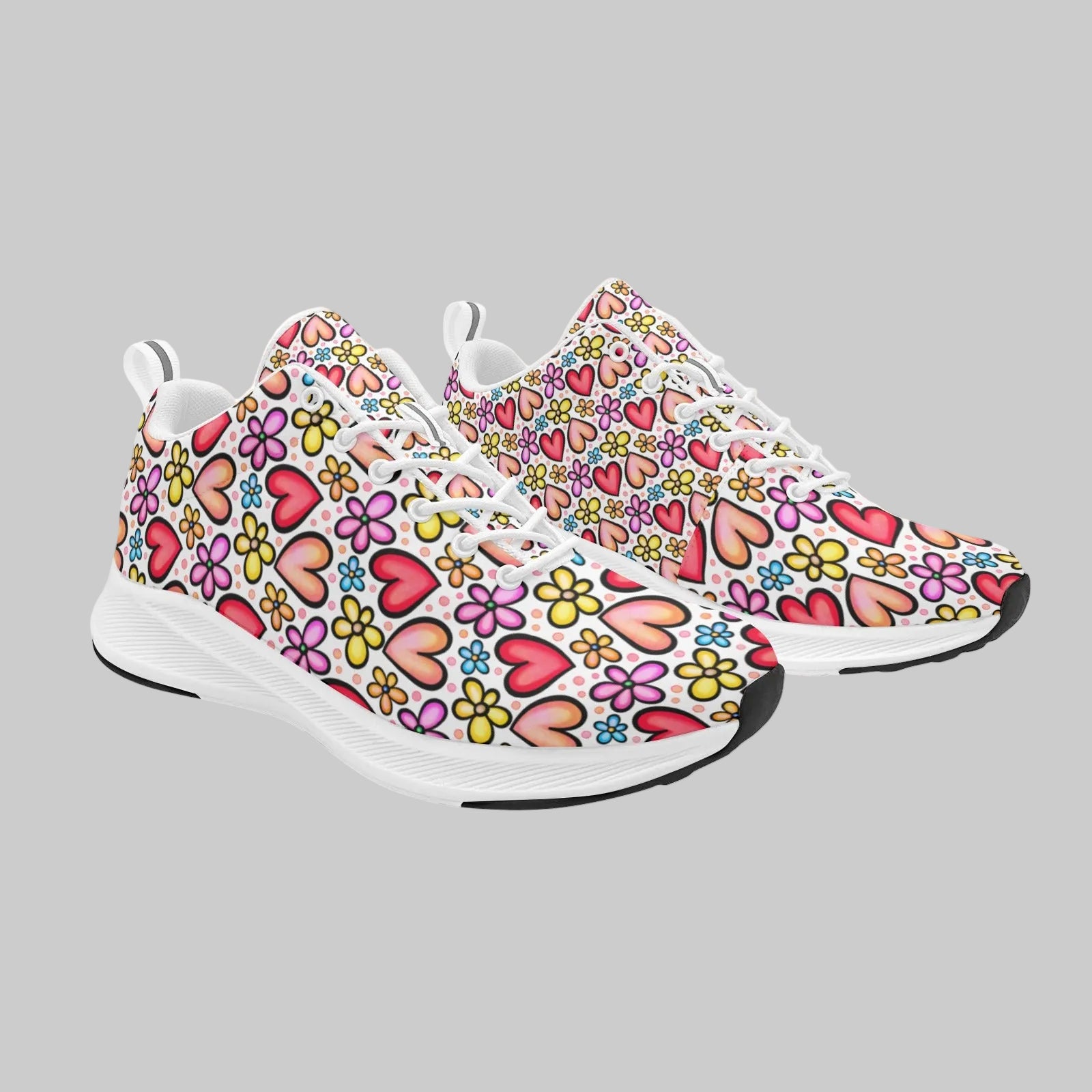 Women's Retro Pop running shoes in white with a colorful 90s-style heart and flower pop art pattern.