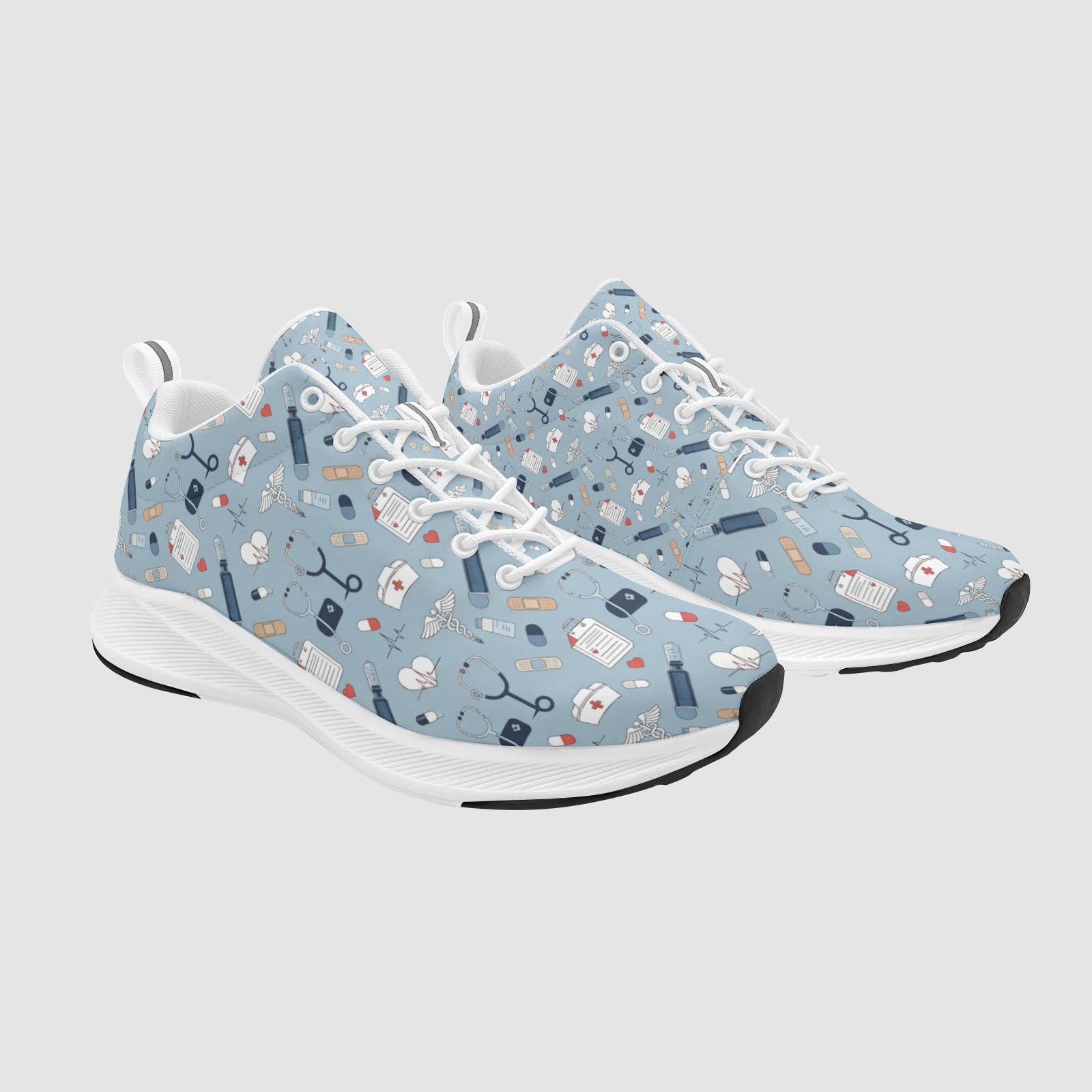 Pair of soft blue nursing sneakers featuring a soothing pastel pattern of heartbeat lines, flowers, and medical icons on a white sole.