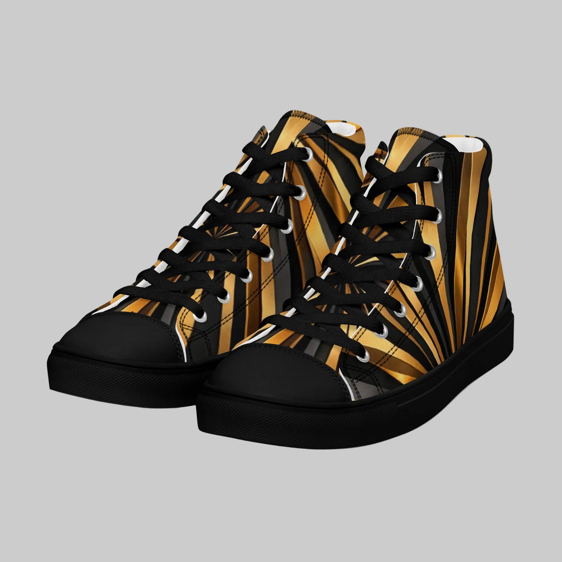 Pair of black high-top canvas sneakers featuring a bold gold, onyx, and yellow sunburst graphic pattern with black laces and black rubber soles.