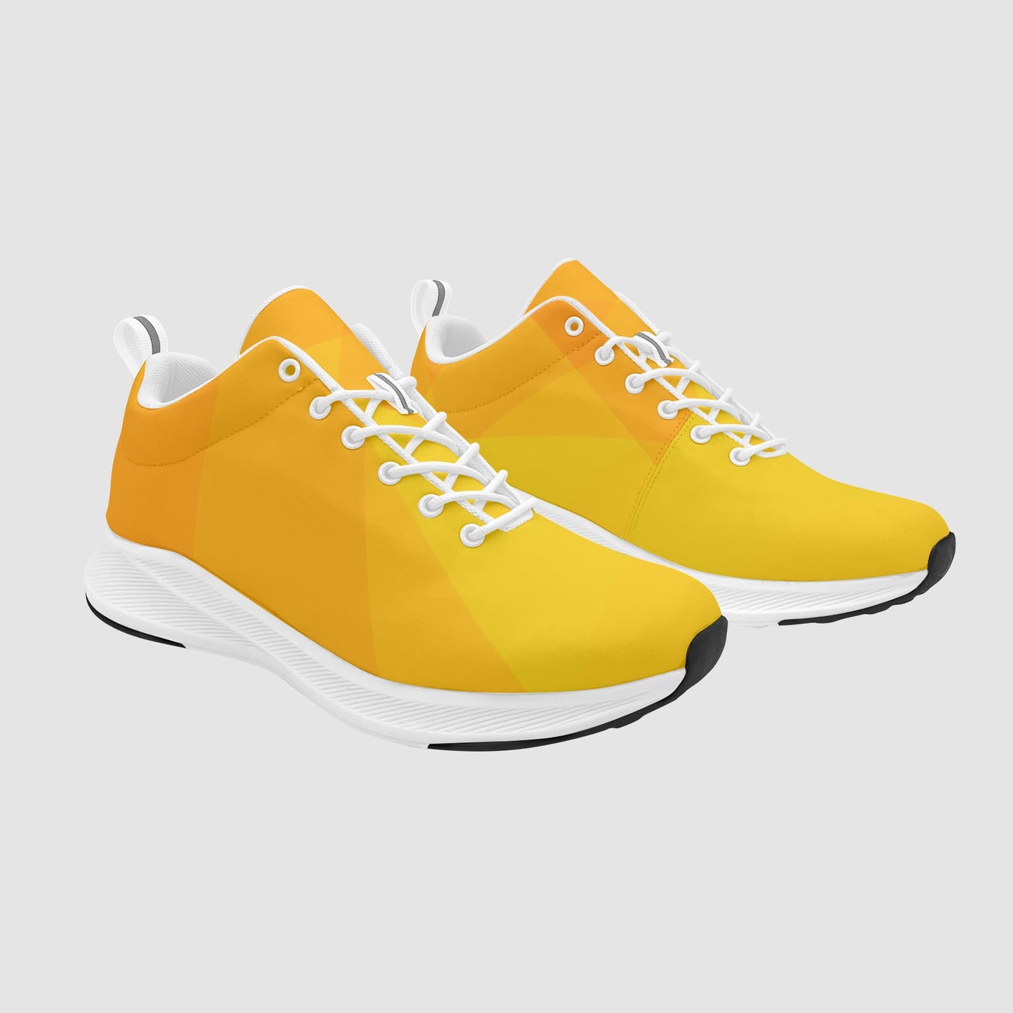 Women's Solar Prism running shoes featuring a vibrant yellow and orange geometric citrus pattern with white midsoles and laces.
